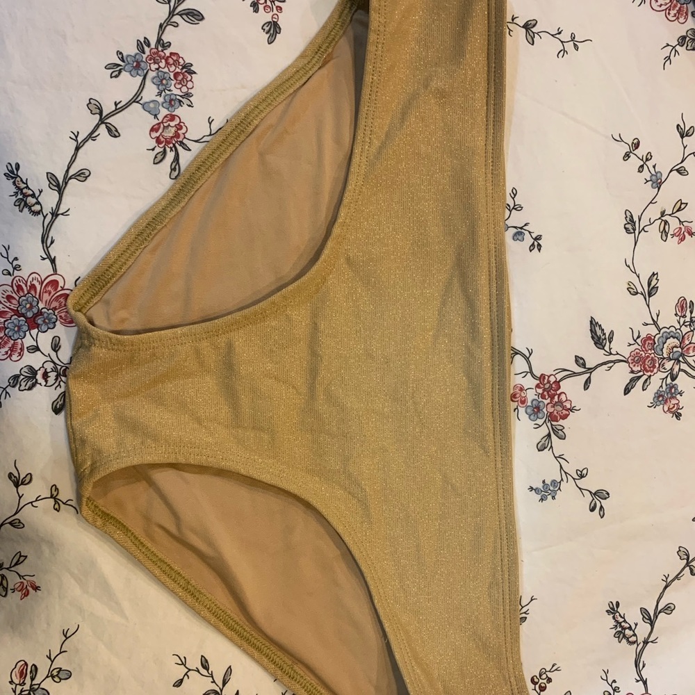 Bottom piece bathing suit. Sparkling gold.